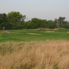 A view of green protected by bunkers at Red Tail Run Golf Club
