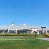 A view of the clubhouse and putting green at Bowes Creek Country Club