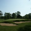 A view of green protected by bunkers at Ravisloe Country Club