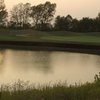 A view over the water of green #3 at Ironhorse Golf Course
