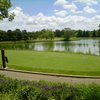 A view of green surrounded by water at Crane's Landing at the Lincolnshire Marriott Resort