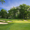 A view of green guarded by bunkers at Cantigny Golf