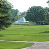 A view from Rolling Knolls Country Club with tent in background