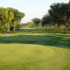 A sunny view of green #18 at Foxford Hills Golf Club