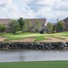 A view of green protected by bunkers at White Deer Run Golf Course
